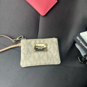 Michael Kors Beige Signature MK Wristlet with Gold Plate